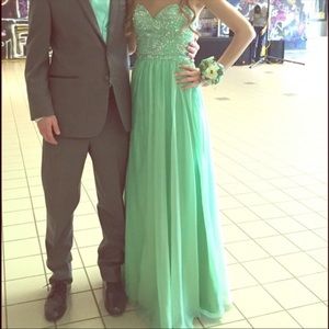 Mint green strappy back prom dress